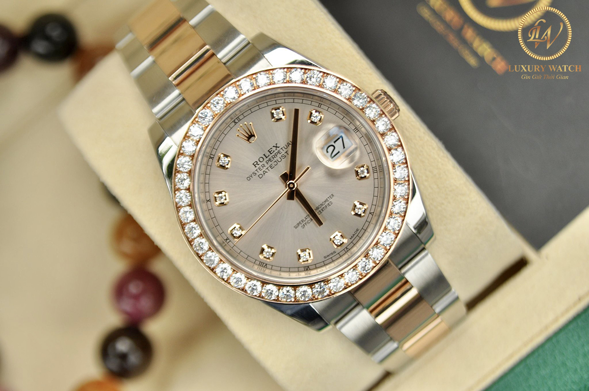 Đồng hồ Rolex Datejust II 126331 cũ mặt tia hồng cọc số niềng kim cương demi vàng 18k size 41mm. Chiếc đồng hồ Rolex Datejust II 126331 với thiết kế sang trọng mạnh mẽ cho các quý ông 1